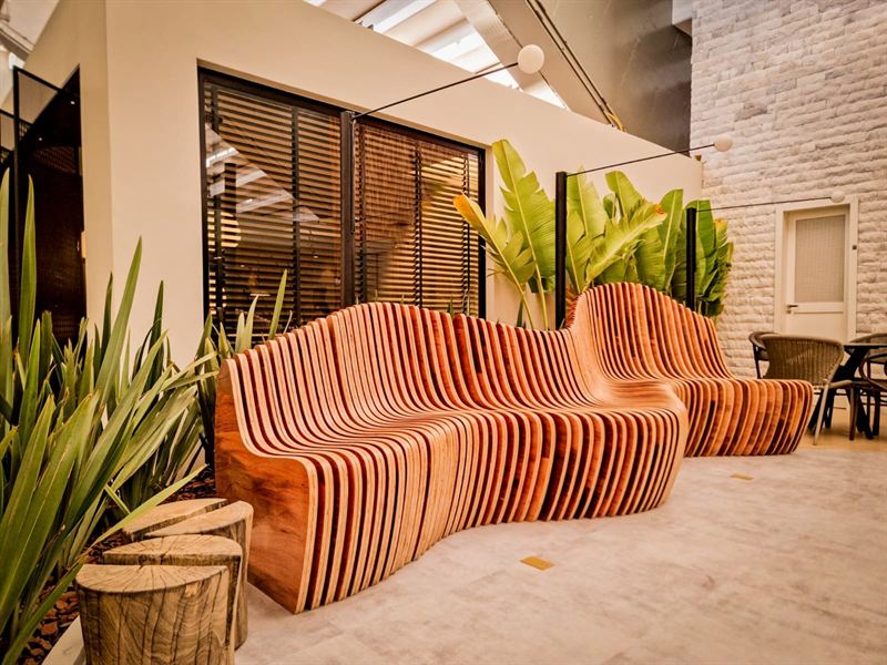 Parametric wood bench with wave-shaped slats
